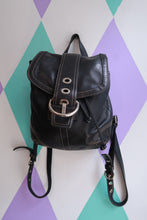 Load image into Gallery viewer, Vintage Coach Soho black leather mini backpack with drawstring closure, ideal for stylish Y2K-inspired bag and purse looks.