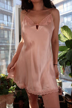 Load image into Gallery viewer, Vintage 2000s Victoria’s Secret peach silk slip dress with lace trim, featuring a flowing silhouette and delicate detailing.