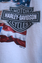 Load image into Gallery viewer, Men's vintage 1990s Harley-Davidson Eagle American Flag long sleeve graphic T-shirt by Elektra Vintage, featuring bold patriotic design.