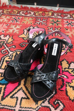 Load image into Gallery viewer, Deadstock vintage Steve Madden black platform wedges with Y2K strappy sandal design, featuring chunky heel and ankle straps.