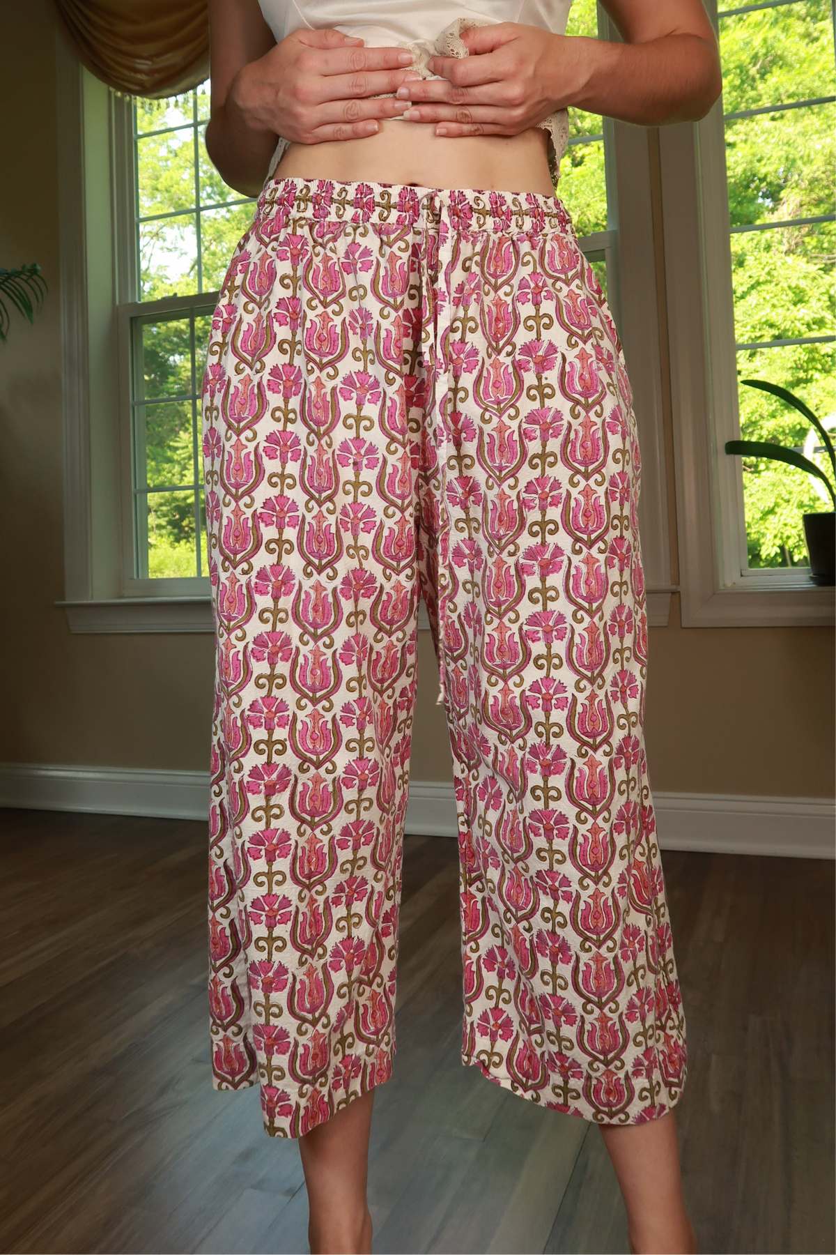 Pink floral print vintage cotton cropped wide leg pants for women by Elektra Vintage, showcasing relaxed fit and floral design.
