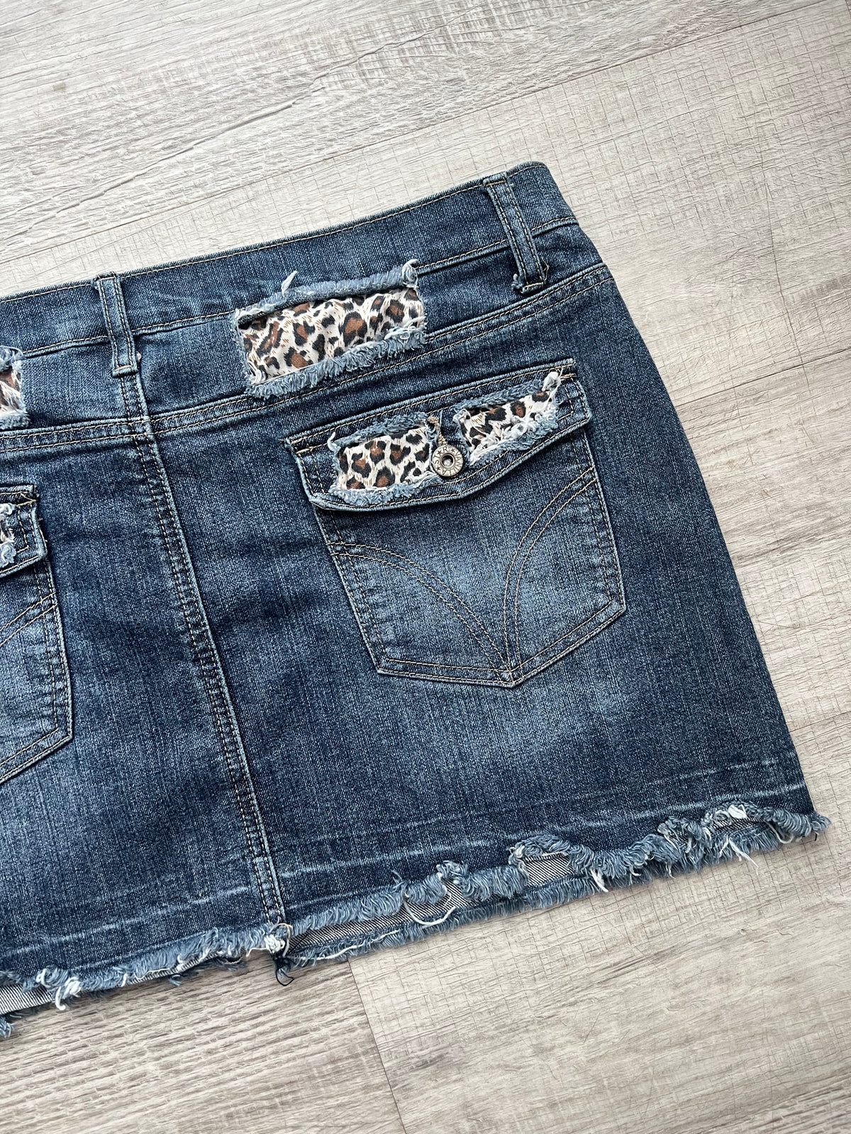 2000s Vintage Denim Mini Skirt with Leopard Print Accents - Elektra Vintage