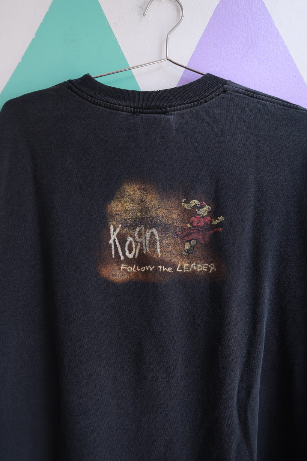 Black men's long sleeve graphic tee featuring vintage 1998 Korn “Follow the Leader” design by Elektra Vintage.
