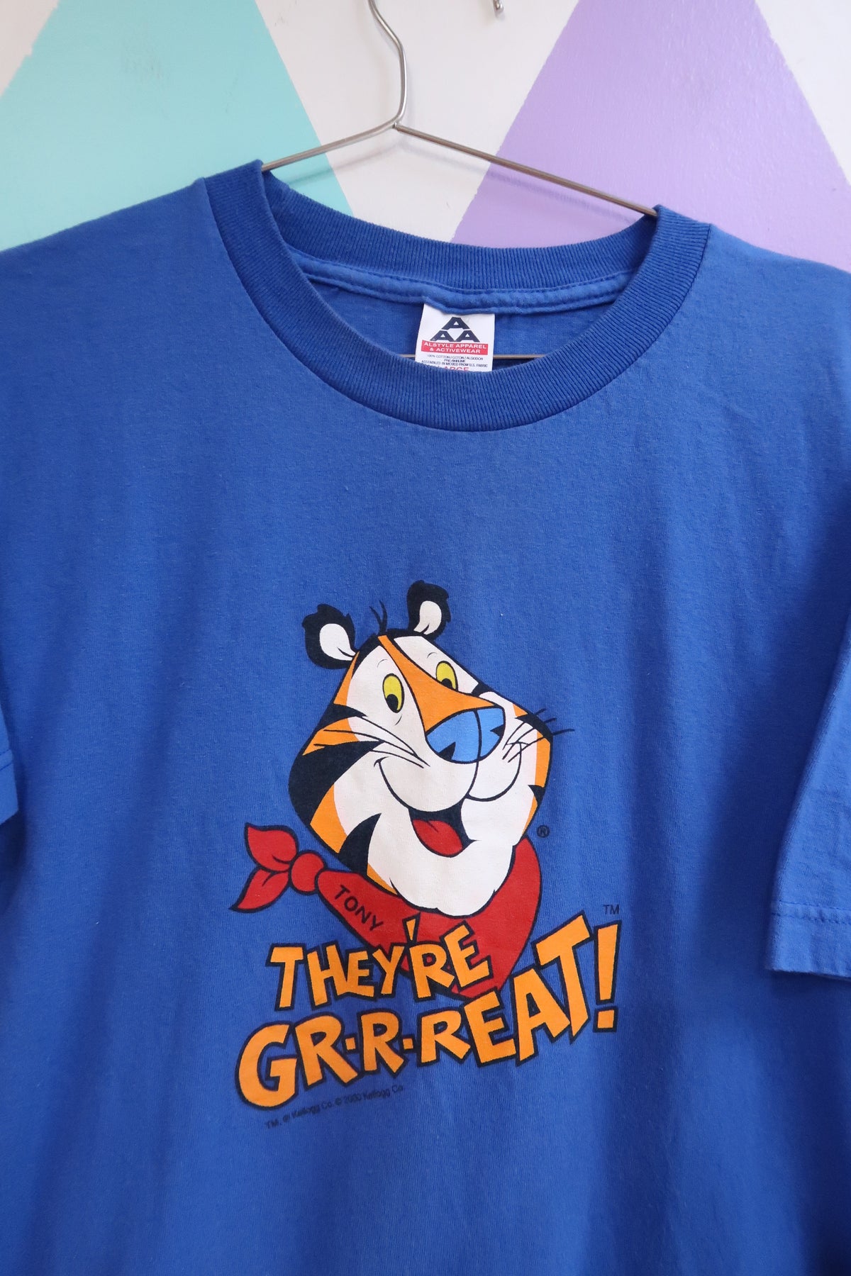 Men's vintage 2000s Tony the Tiger graphic T-shirt by Elektra Vintage, featuring bold tiger mascot design on a classic top.