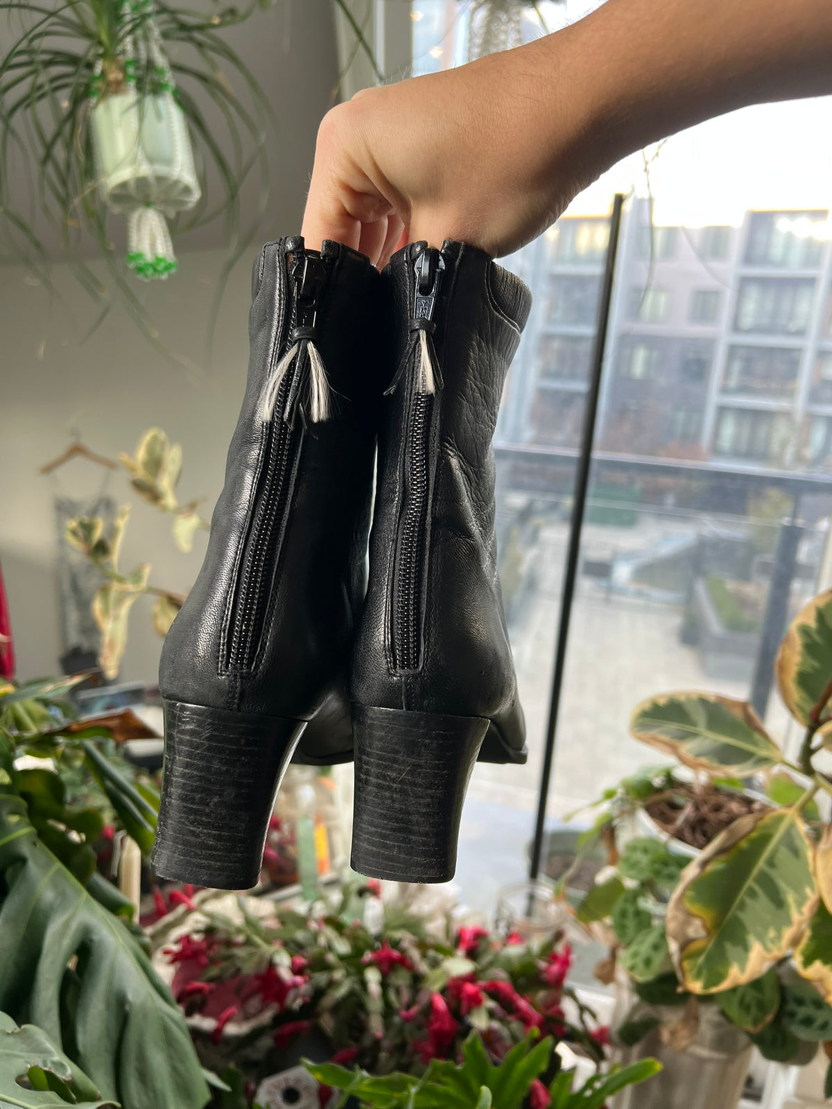Vintage Stuart Weitzman square toe boots in black leather with chunky heels, styled with casual fall outfit.