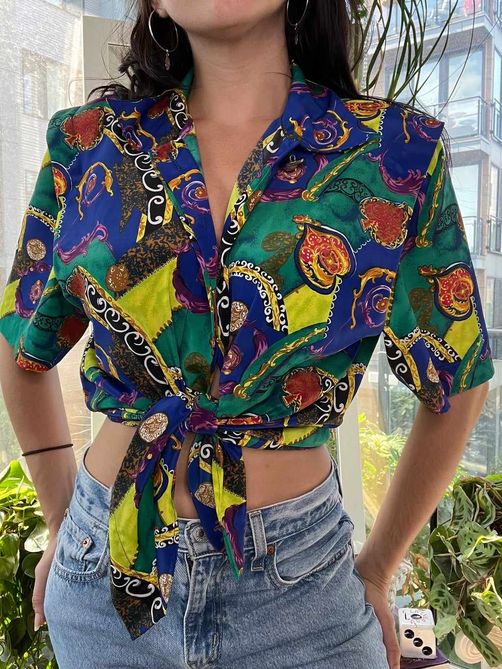 Women's vintage 80s abstract pattern button-up top by Notations, featuring bold geometric print and classic collar.