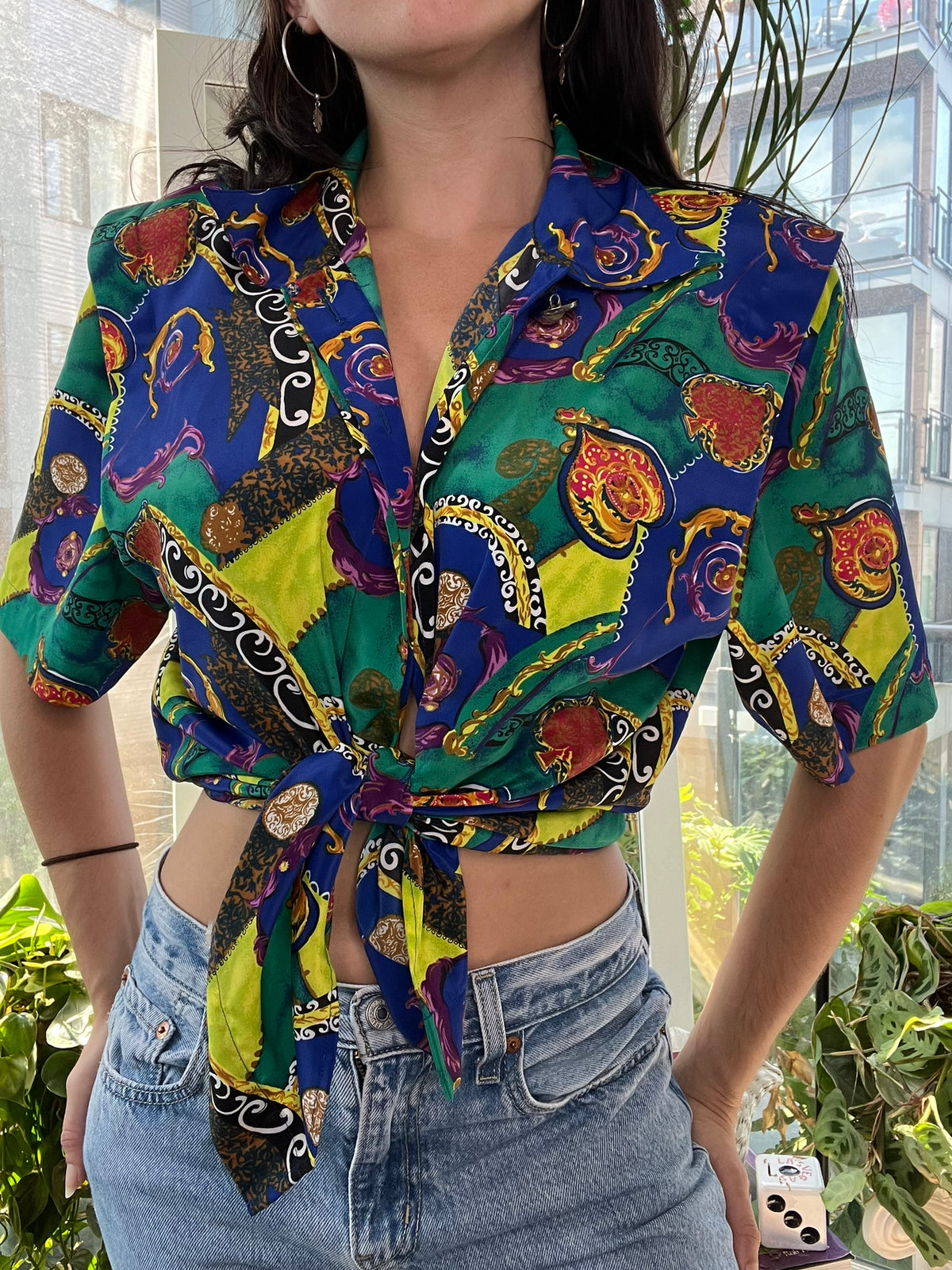 Women's vintage 80s abstract pattern button-up top by Notations, featuring bold geometric print and classic collar.