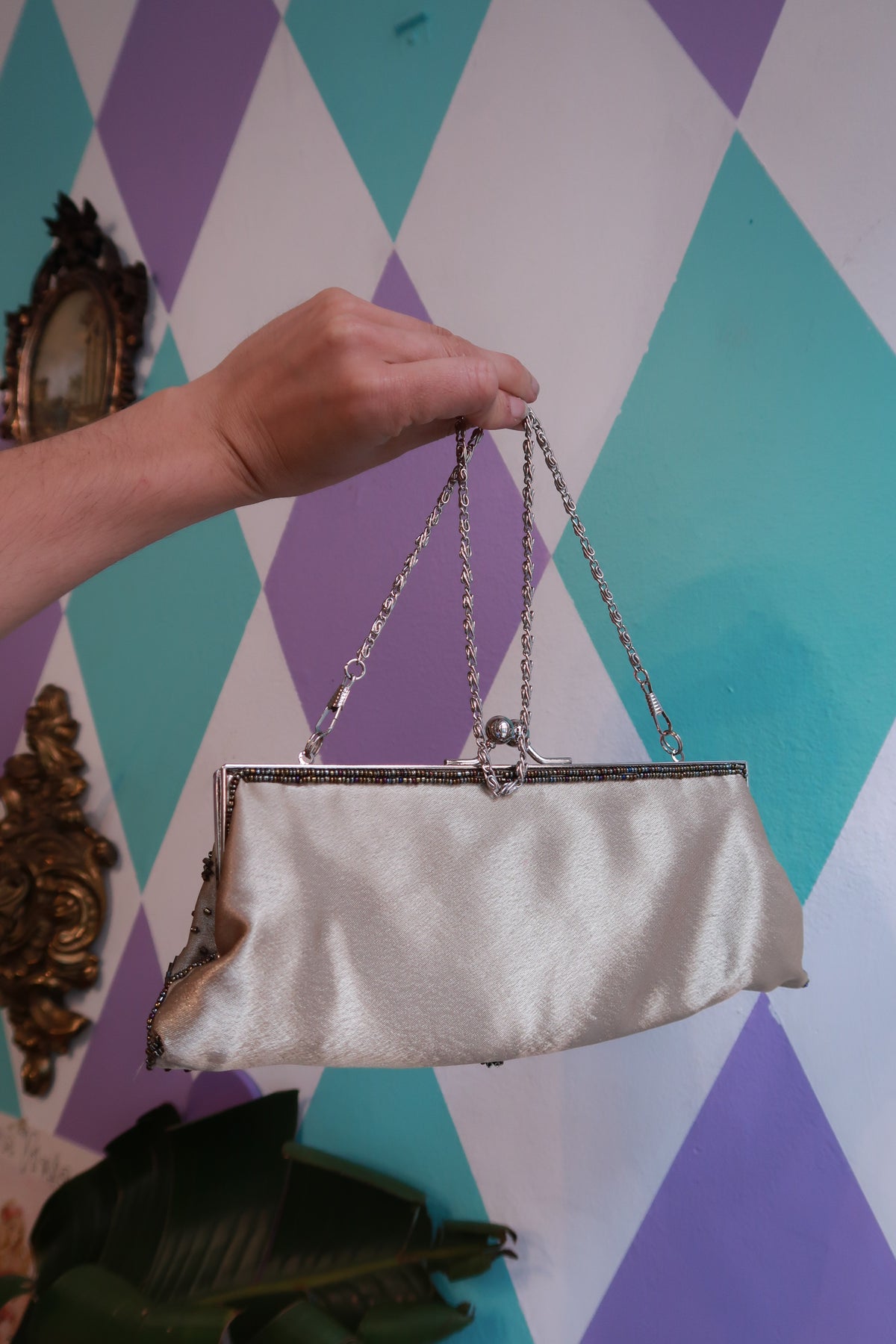 Vintage silver beaded evening clutch bag with sequin floral details and chain handle by Elektra Vintage.