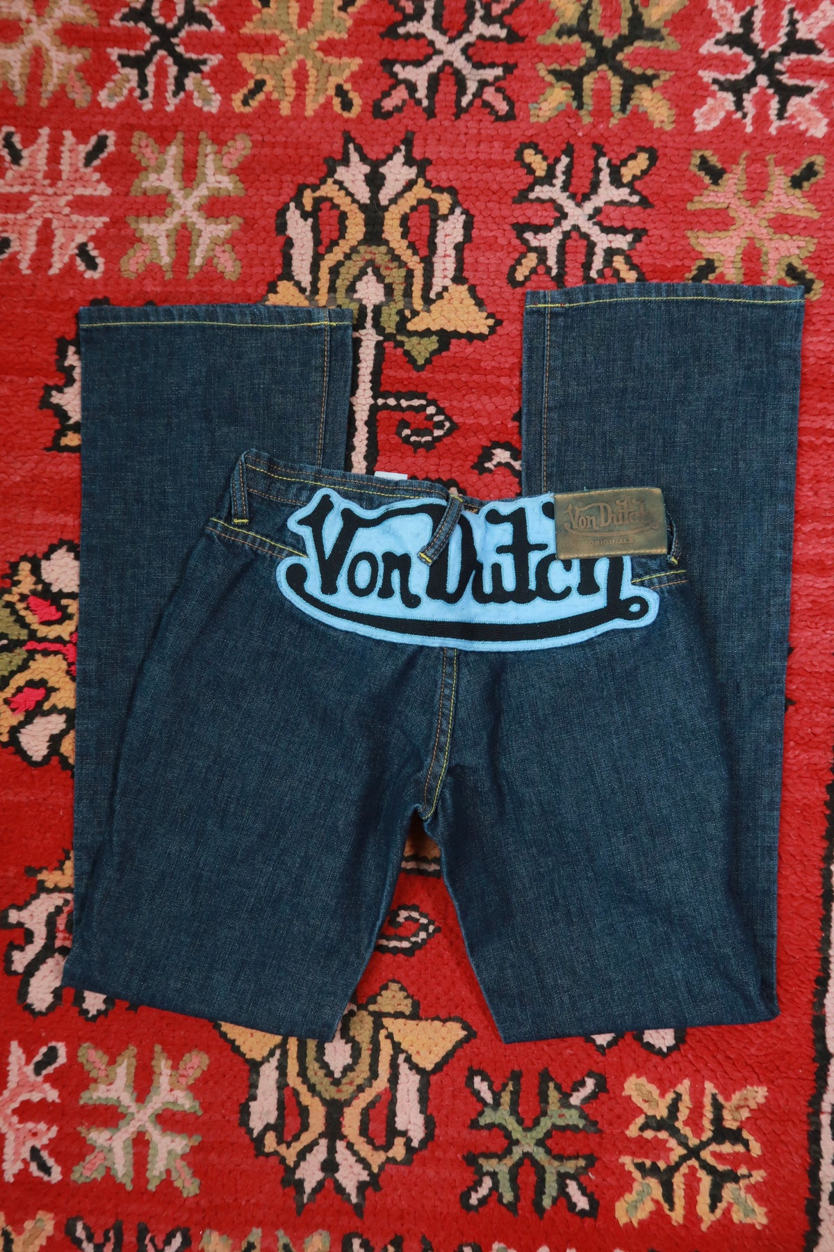 Vintage 2000s Von Dutch dark wash low rise bootcut jeans for women, size 27, by Elektra Vintage.