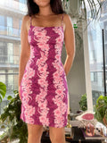 Y2K vintage tropical floral open-back midi dress by Elektra Vintage, featuring vibrant floral patterns and a stylish open back design.