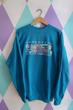 Load image into Gallery viewer, Vintage 90s Elektra Vintage Pike Place Market Seattle crewneck with bright teal background and fruit and fish graphic.
