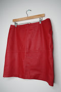 Vintage red leather skirt from Elektra Vintage, showcasing a stylish high-waisted design with a sleek, smooth texture.