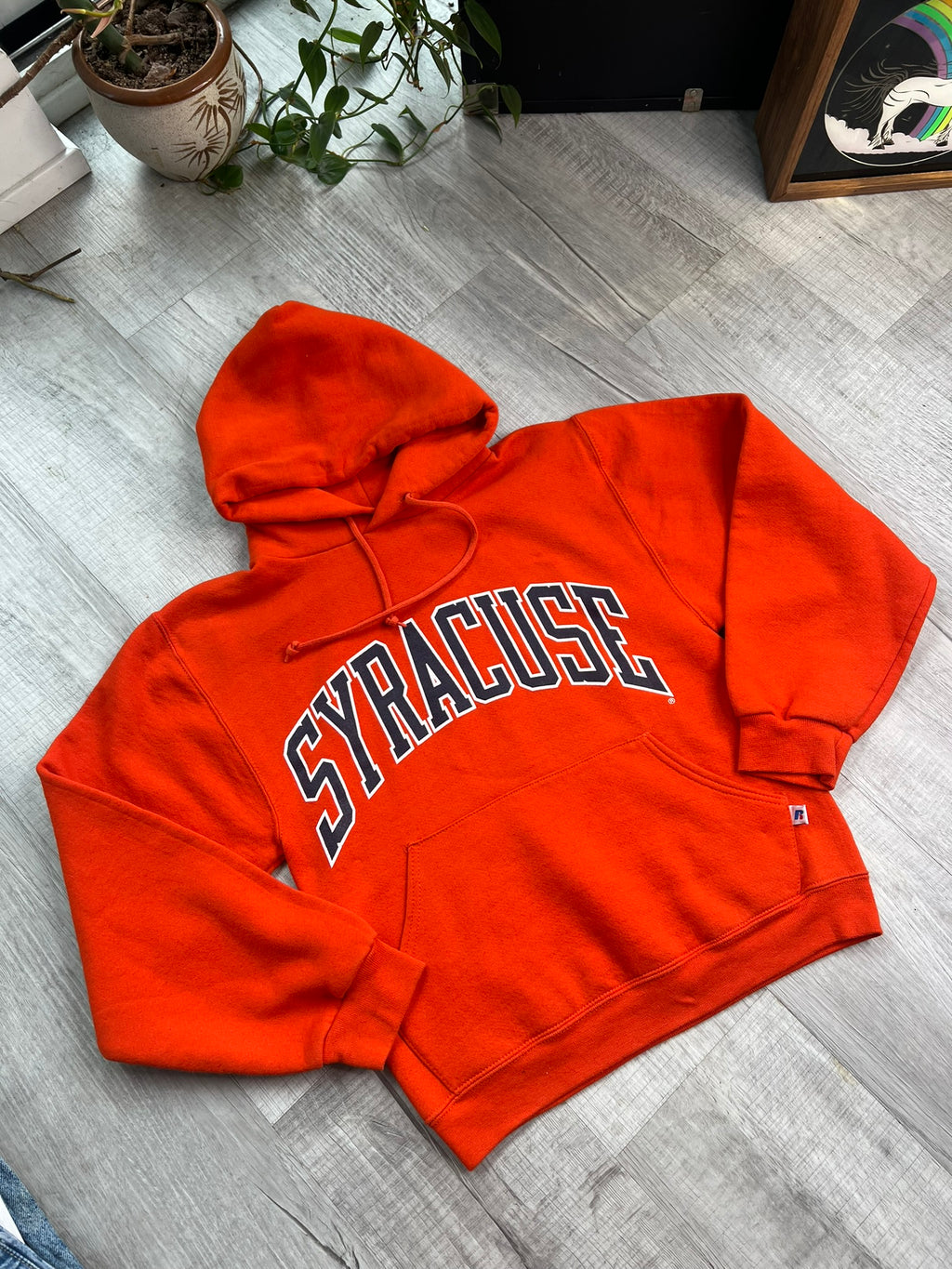 Vintage orange Syracuse University hoodie by Elektra Vintage, featuring university logo and classic sweatshirt design.
