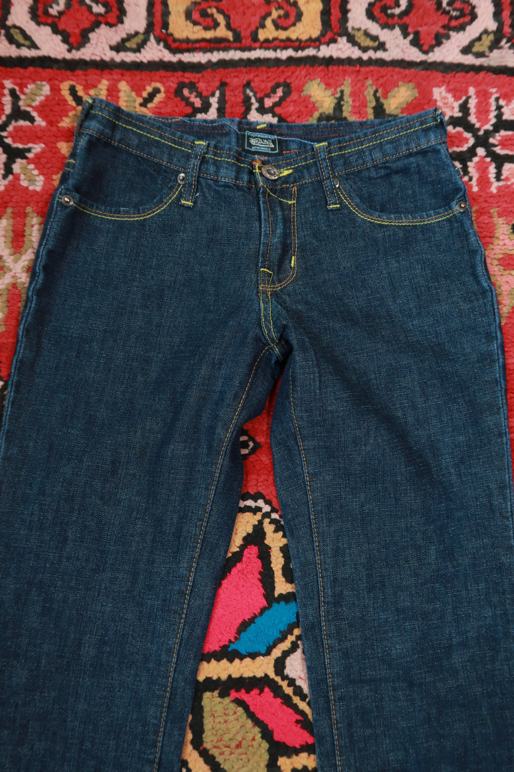 Vintage 2000s Von Dutch dark wash low rise bootcut jeans for women, size 27, from Elektra Vintage, styled with classic denim details.