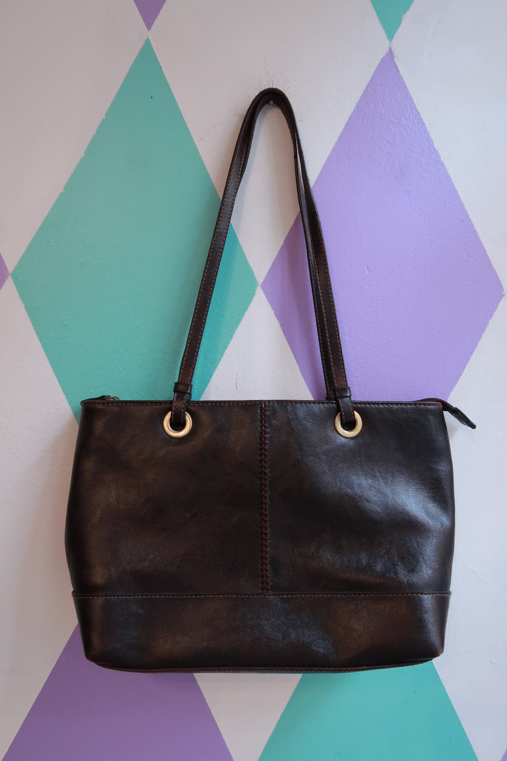 Vintage espresso brown Elektra Vintage shoulder bag with minimalist tote design, featuring a sleek leather purse style.