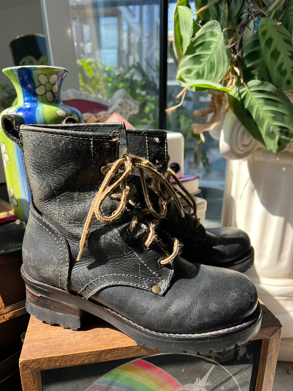 Vintage Elektra Vintage MIA leather combat boots with rugged design and lace-up front, styled with worn-in detailing.