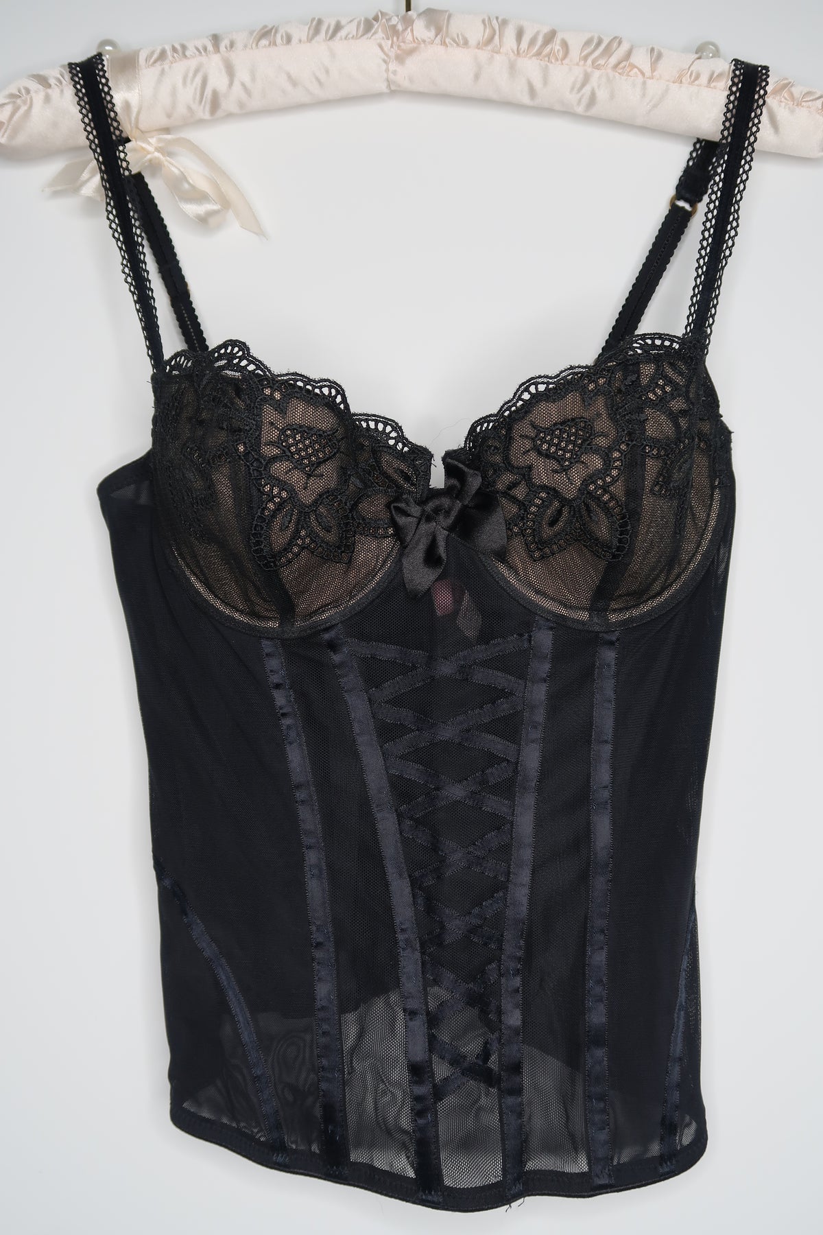 Vintage 2000s Victoria's Secret corset top for women, black lace design, by Elektra Vintage, close-up of fitted bust and intricate details.
