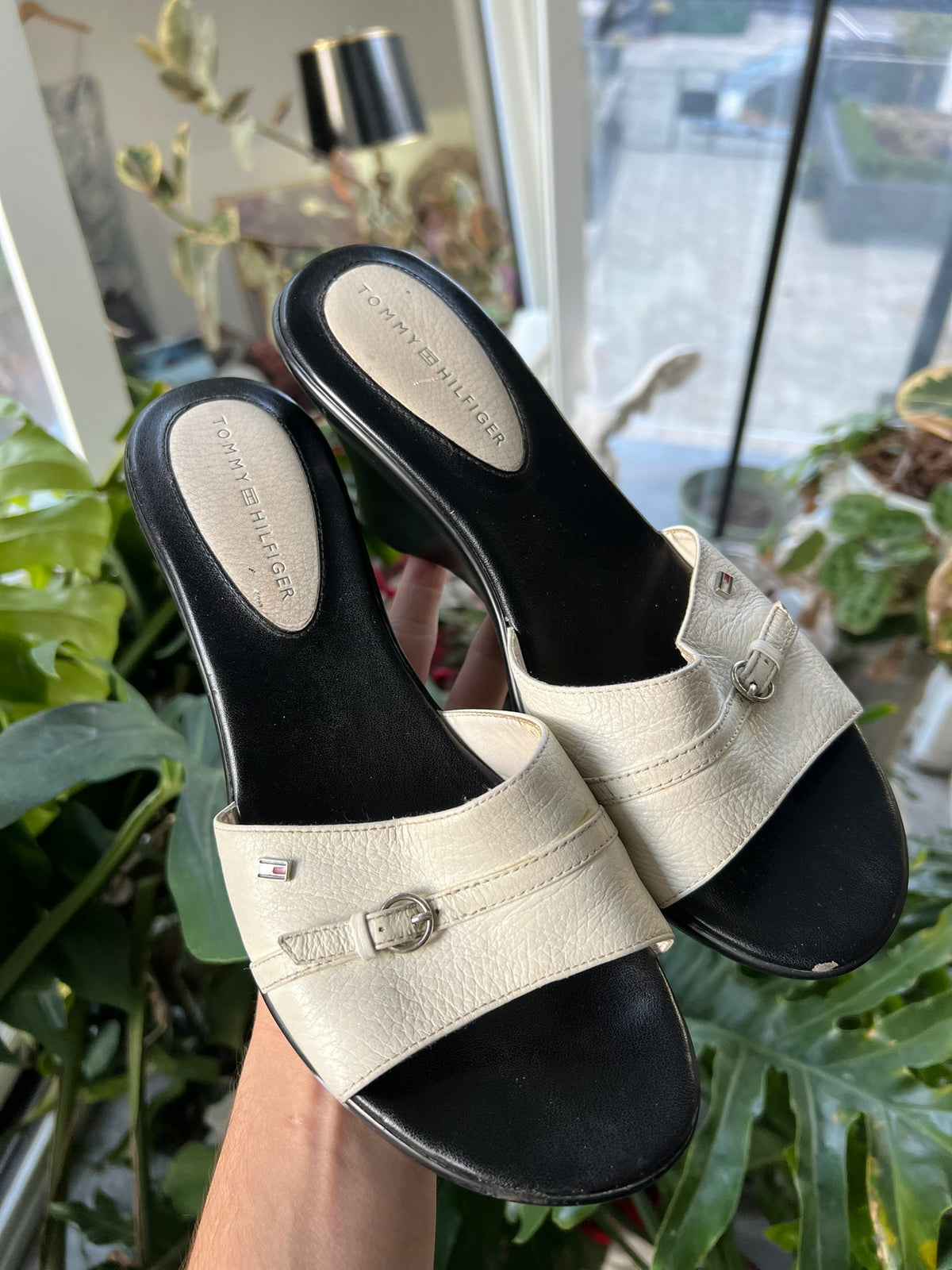 Vintage 2000s Tommy Hilfiger wedge sandals with open toes and chunky heels, featuring classic flag logo accents.