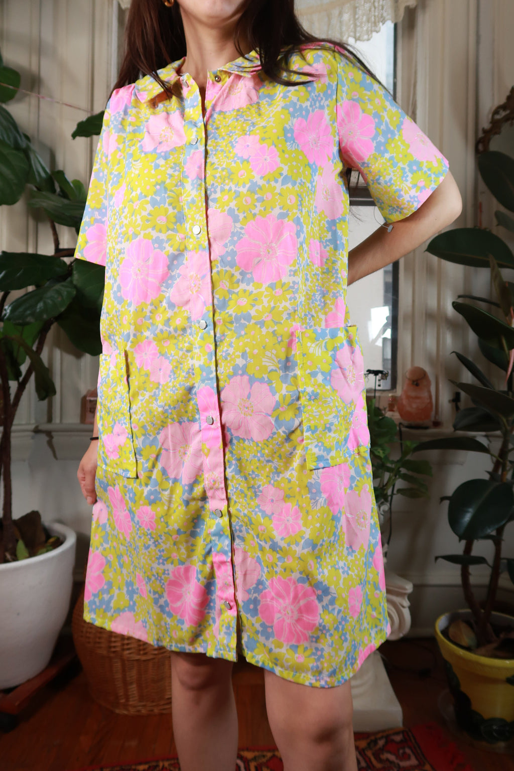 Vintage 1960s floral house dress by Elektra Vintage with pink and yellow flower print, lightweight and classic retro style.