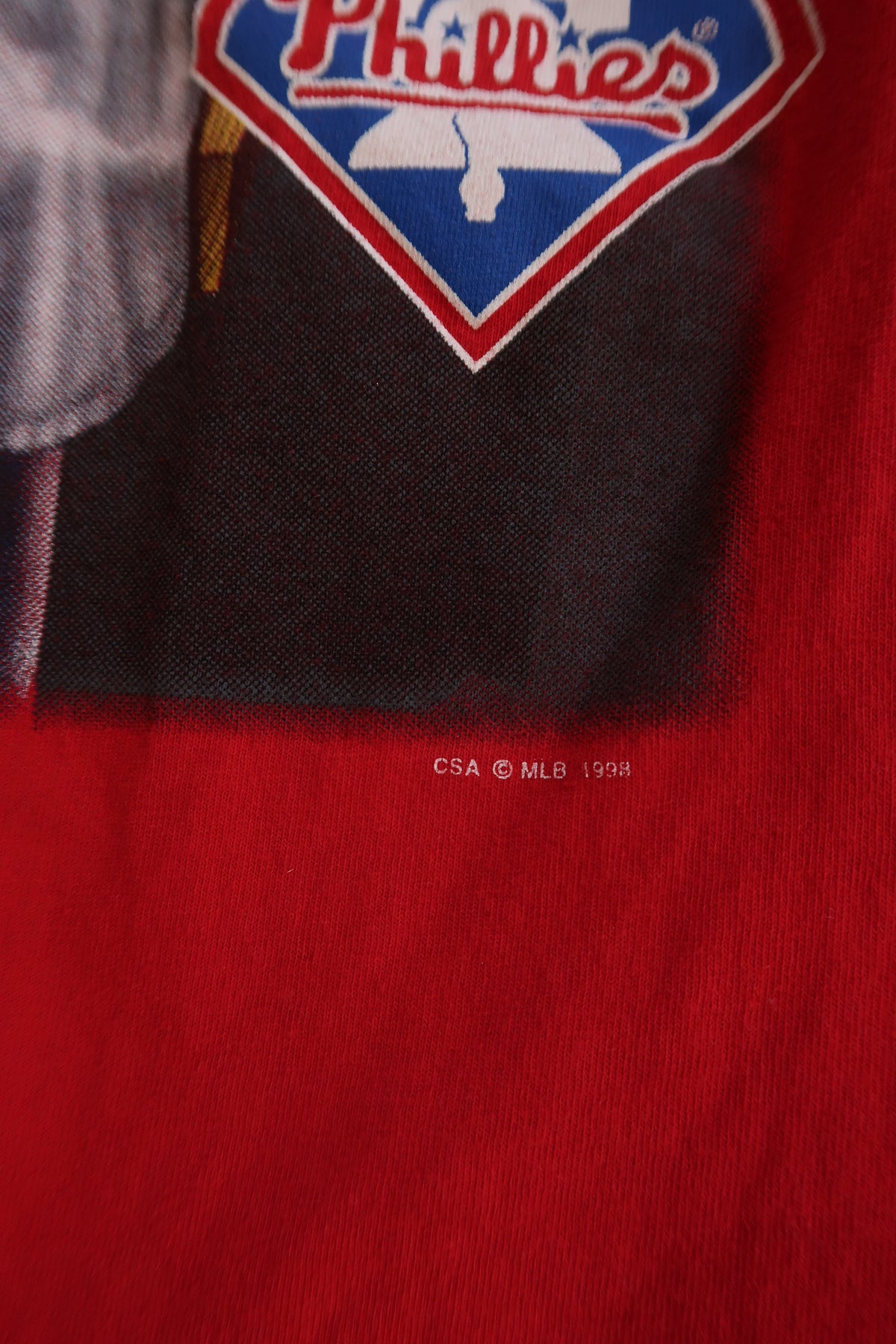 Women's vintage 1998 Philadelphia Phillies graphic tee in red by Elektra Vintage, featuring team logo and retro design.