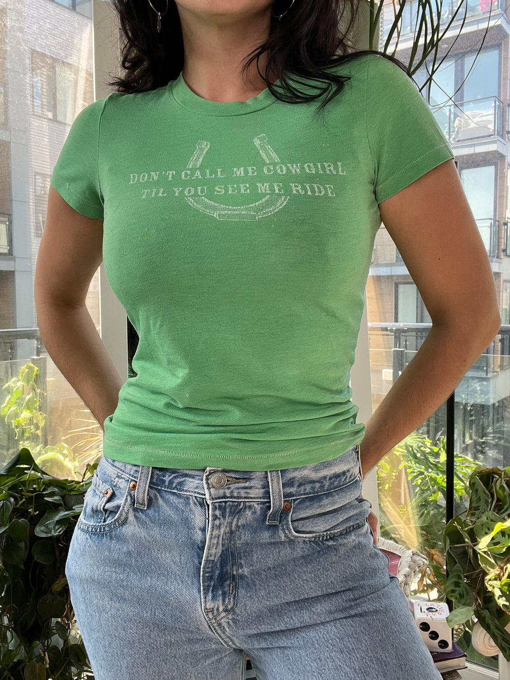 Vintage green cowgirl baby tee by Abercrombie, women's top from Elektra Vintage with cowgirl graphic and casual fit.