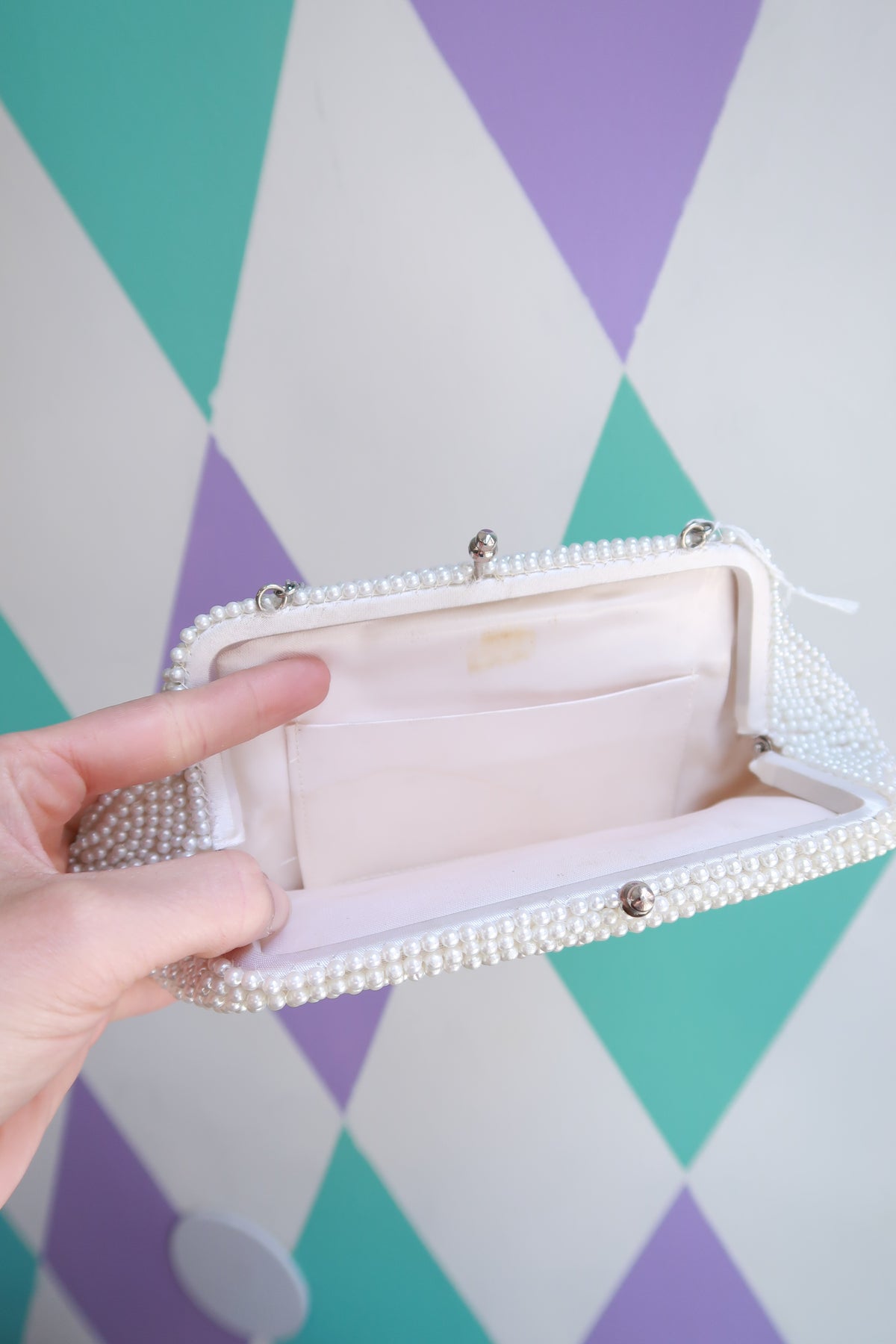 Elektra Vintage vintage beaded pearl handbag with silver floral embellishments and top handle, ideal for bridal or evening occasions.