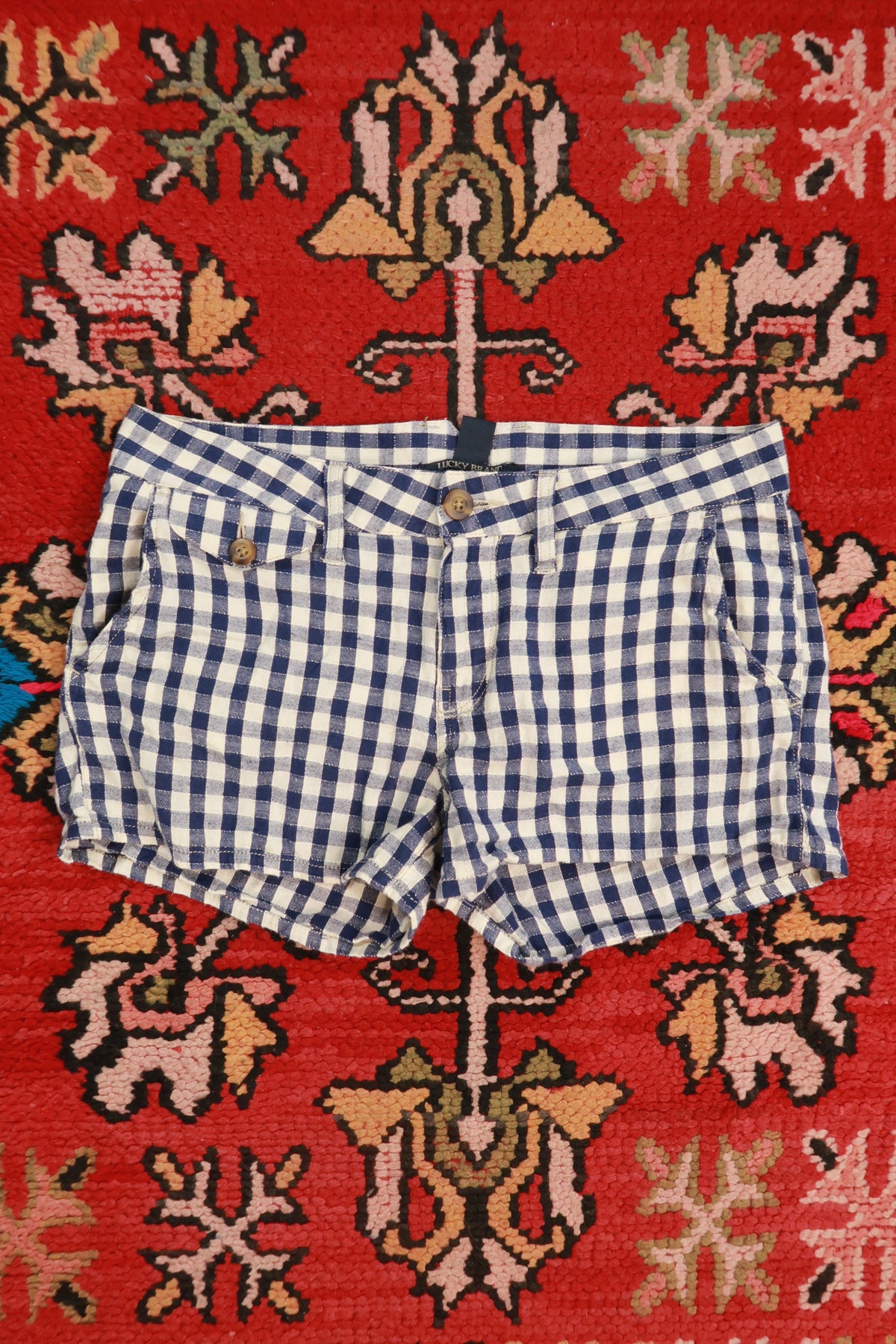 Women's navy blue gingham linen blend shorts by Lucky Brand, vintage 2000s style, with a relaxed fit and casual design.