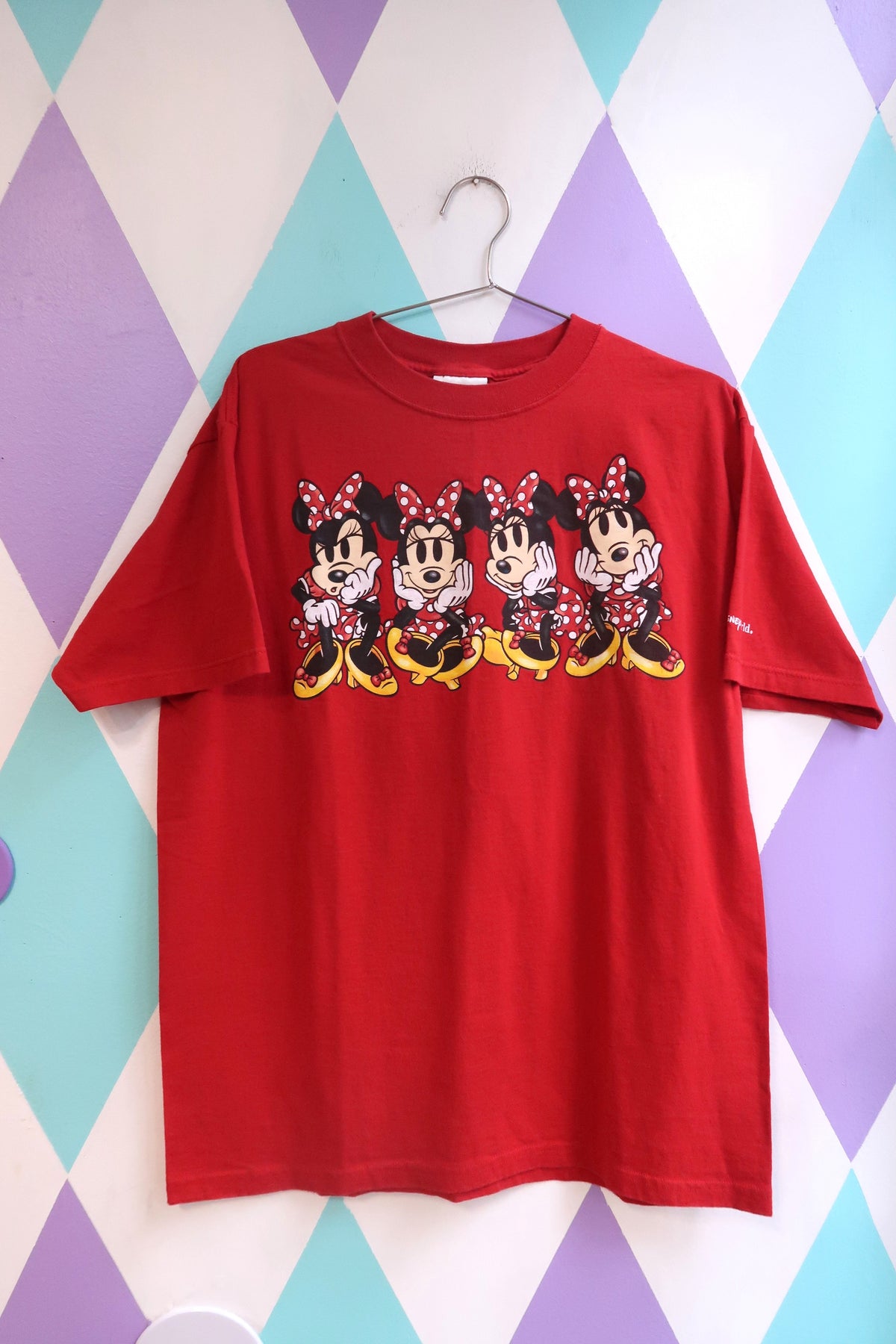 Vintage 90s Minnie Mouse graphic T-shirt by Elektra Vintage featuring a colorful cartoon Minnie design on soft fabric.