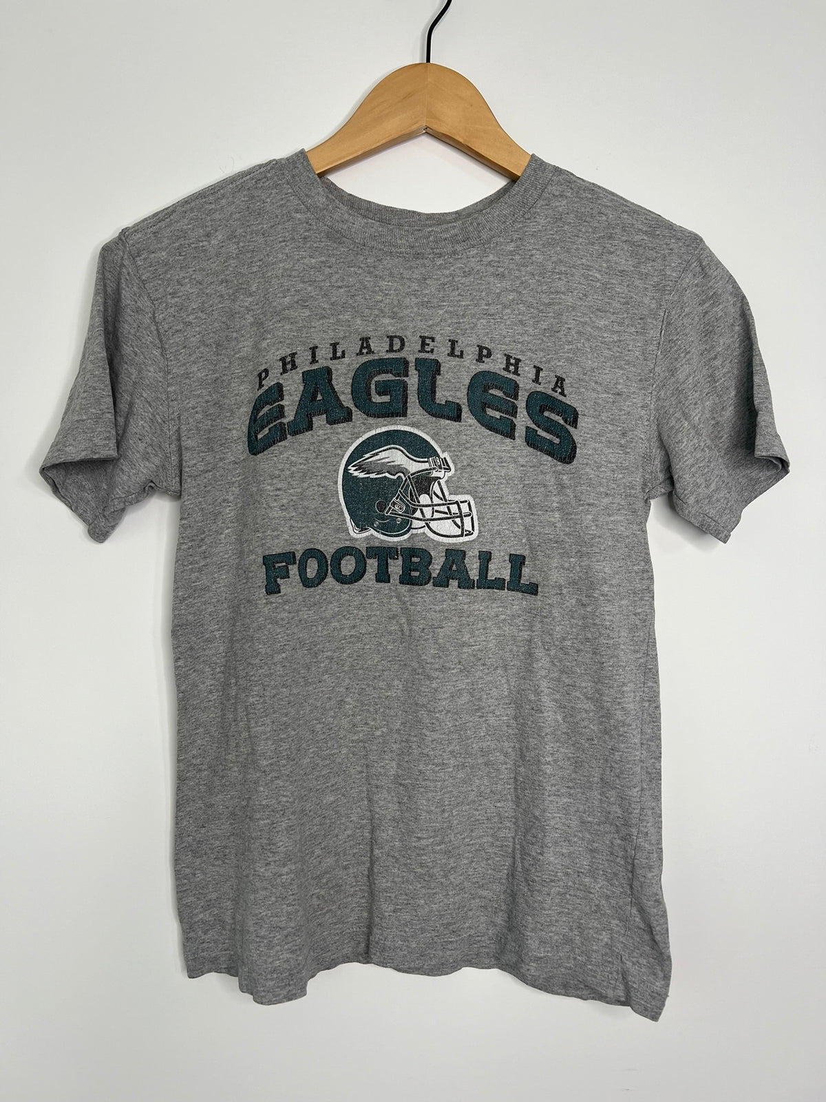 Elektra Vintage Eagles football graphic baby doll tee featuring a colorful football design on soft cotton fabric.