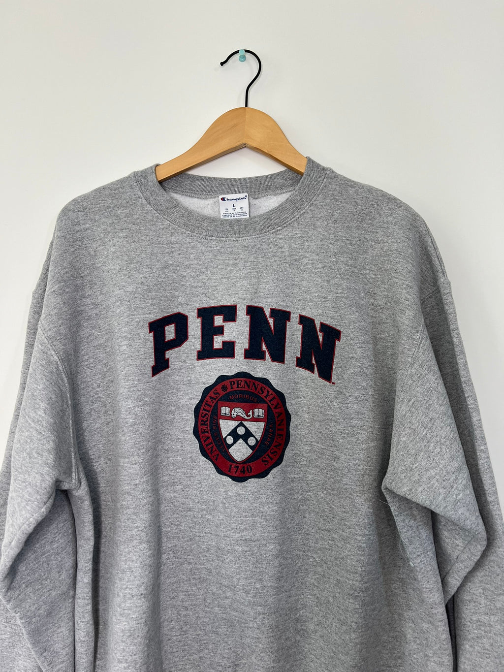 Elektra Vintage UPenn graphic crewneck sweatshirt in navy with university logo and text, casual fit, front view.