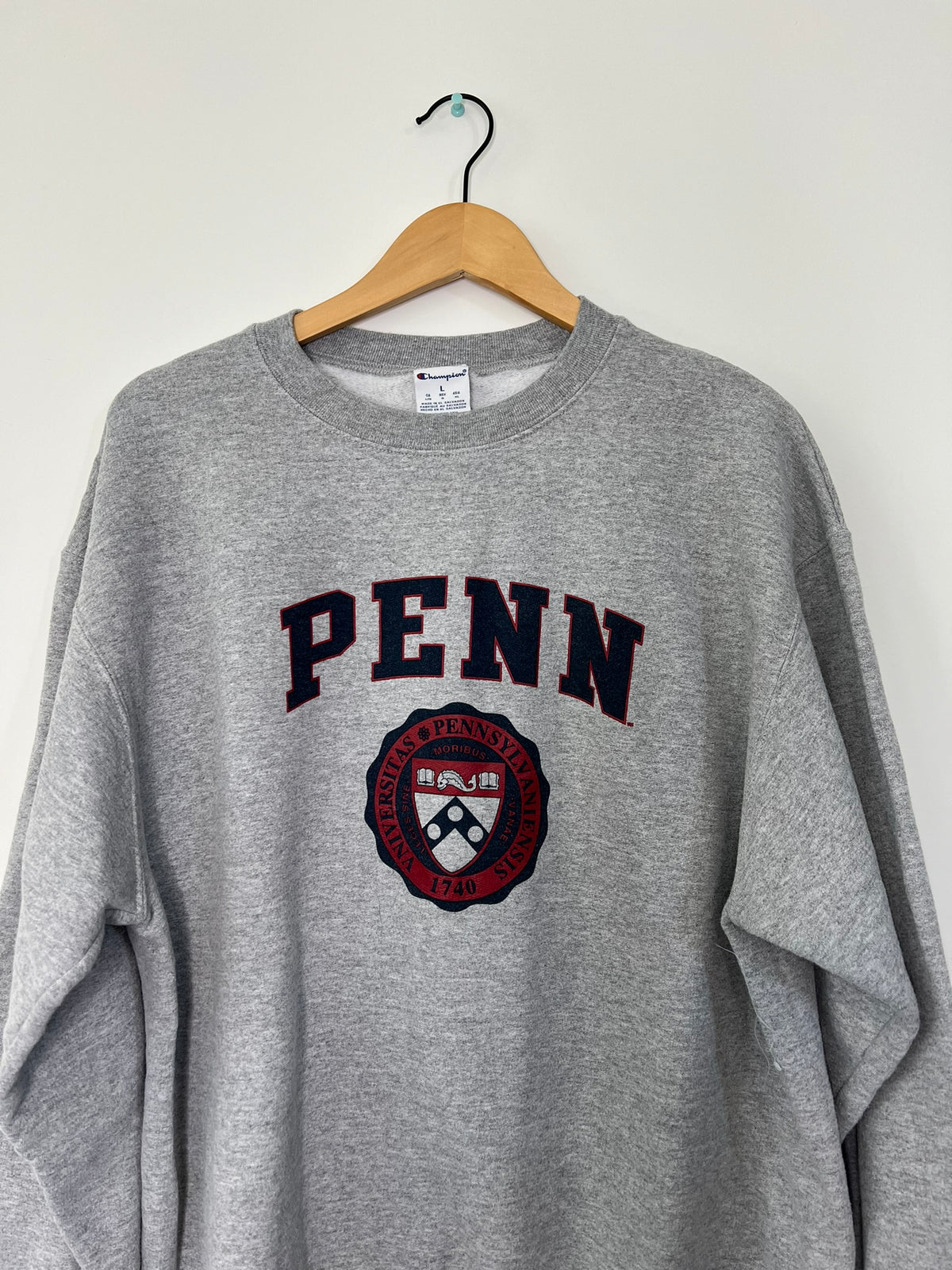 Elektra Vintage UPenn graphic crewneck sweatshirt in navy with university logo and text, casual fit, front view.