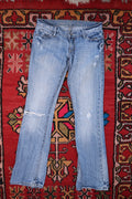 Elektra Vintage Y2K Abercrombie & Fitch distressed low-rise women's jeans with a vintage, distressed denim look.
