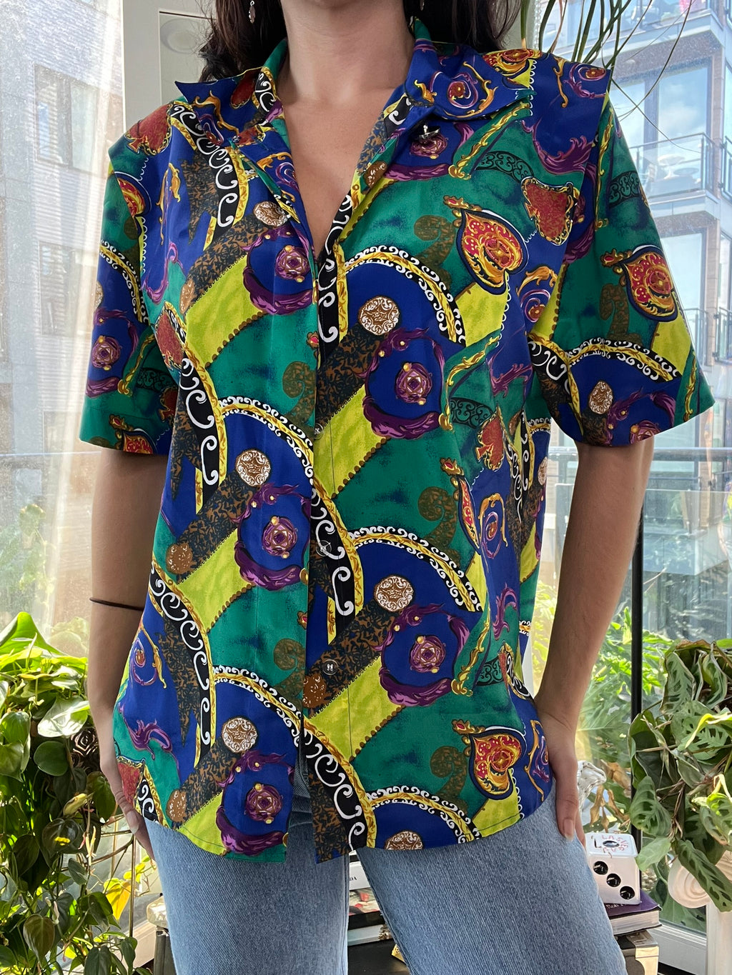 Vintage 80s abstract pattern women's button-up top by Notations, featuring bold colorful design and classic fit.