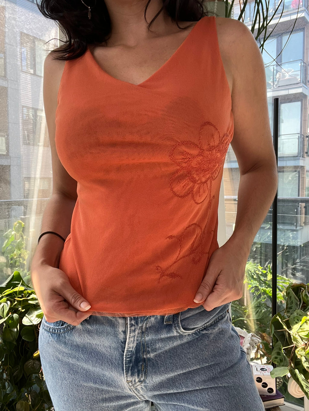 Vintage orange floral tank top for women by Elektra Vintage, featuring a sleeveless design with a 2000s-inspired style.