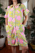 Vintage 1960s floral house dress in pink and yellow from Elektra Vintage, featuring a classic 1970s-inspired design.