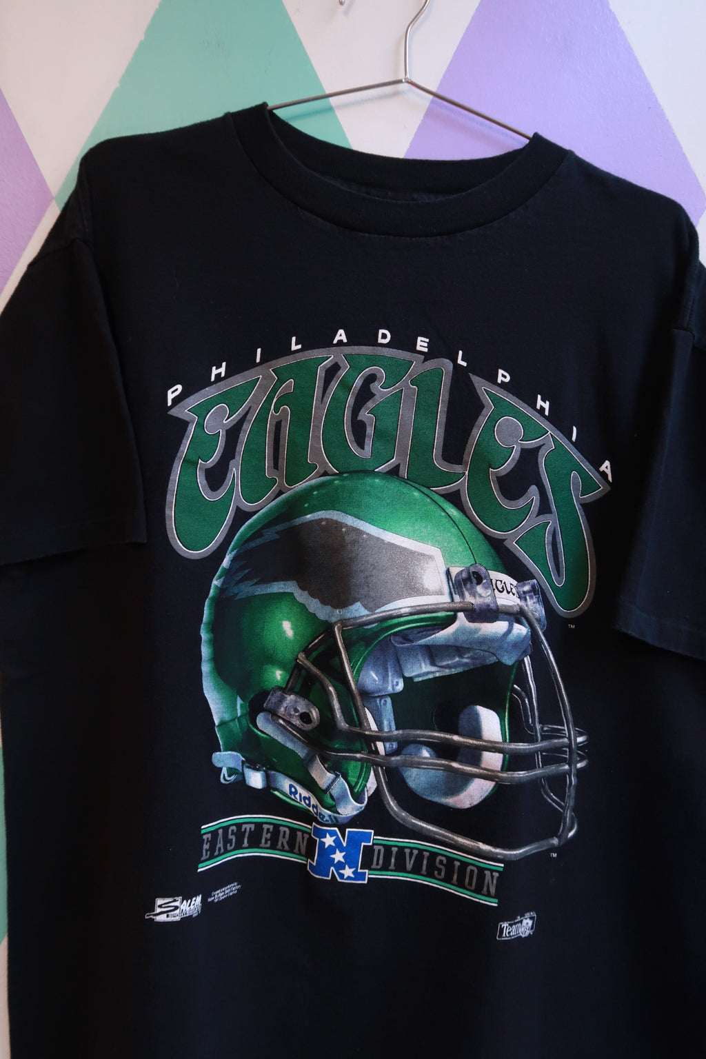Black Elektra Vintage men's T-shirt featuring a vintage 1991 Philadelphia Eagles football helmet graphic.