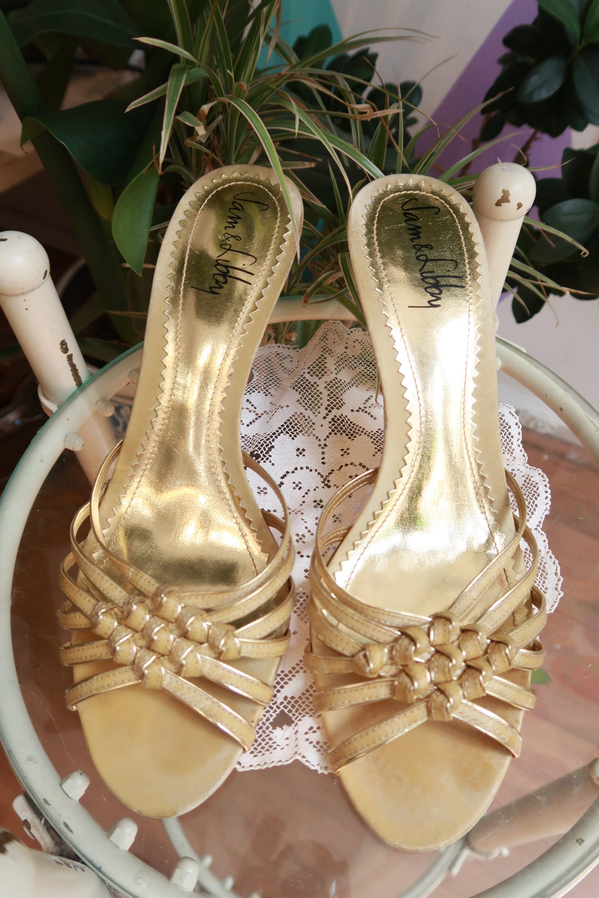 Vintage Y2K gold strappy mule heels by Elektra Vintage, featuring a sleek design with multiple thin straps and a low heel.