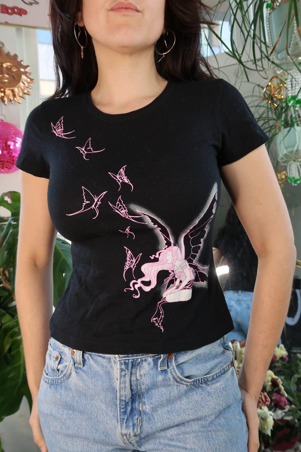 Pink fairy butterfly graphic T-shirt for women by Mighty Fine, vintage 2000s Doe design, from Elektra Vintage.