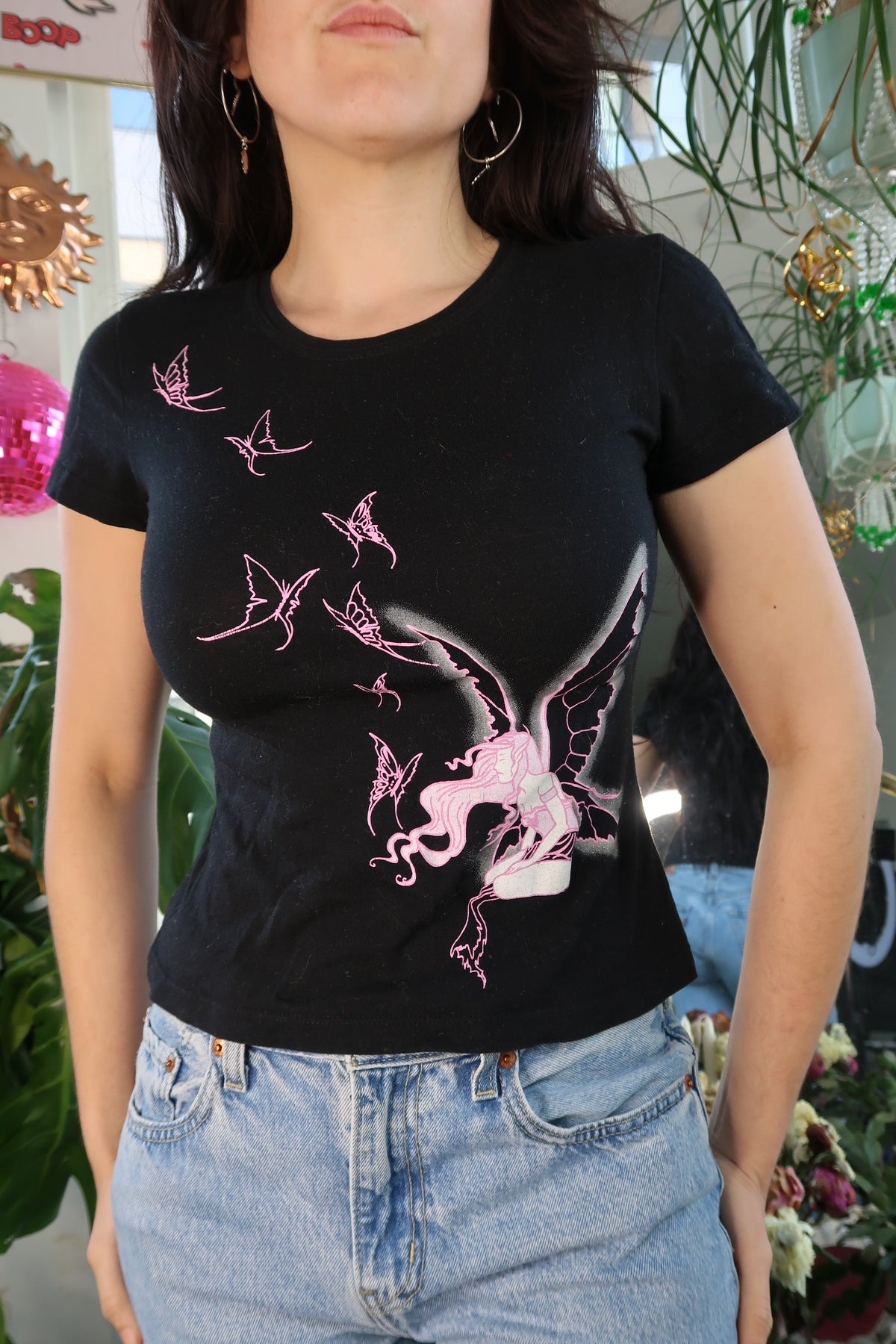 Pink fairy butterfly graphic T-shirt for women by Mighty Fine, vintage 2000s Doe design, from Elektra Vintage.