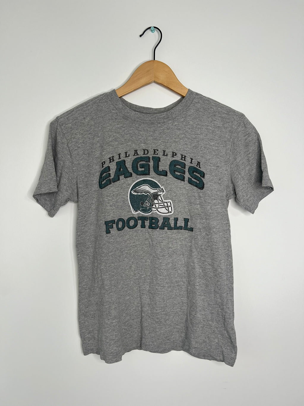 Elektra Vintage Eagles football graphic baby doll tee, soft cotton shirt with team logo and playful football design.