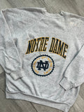 Vintage University of Notre Dame crewneck sweatshirt by Elektra Vintage, with college logo and classic sweatshirt design.