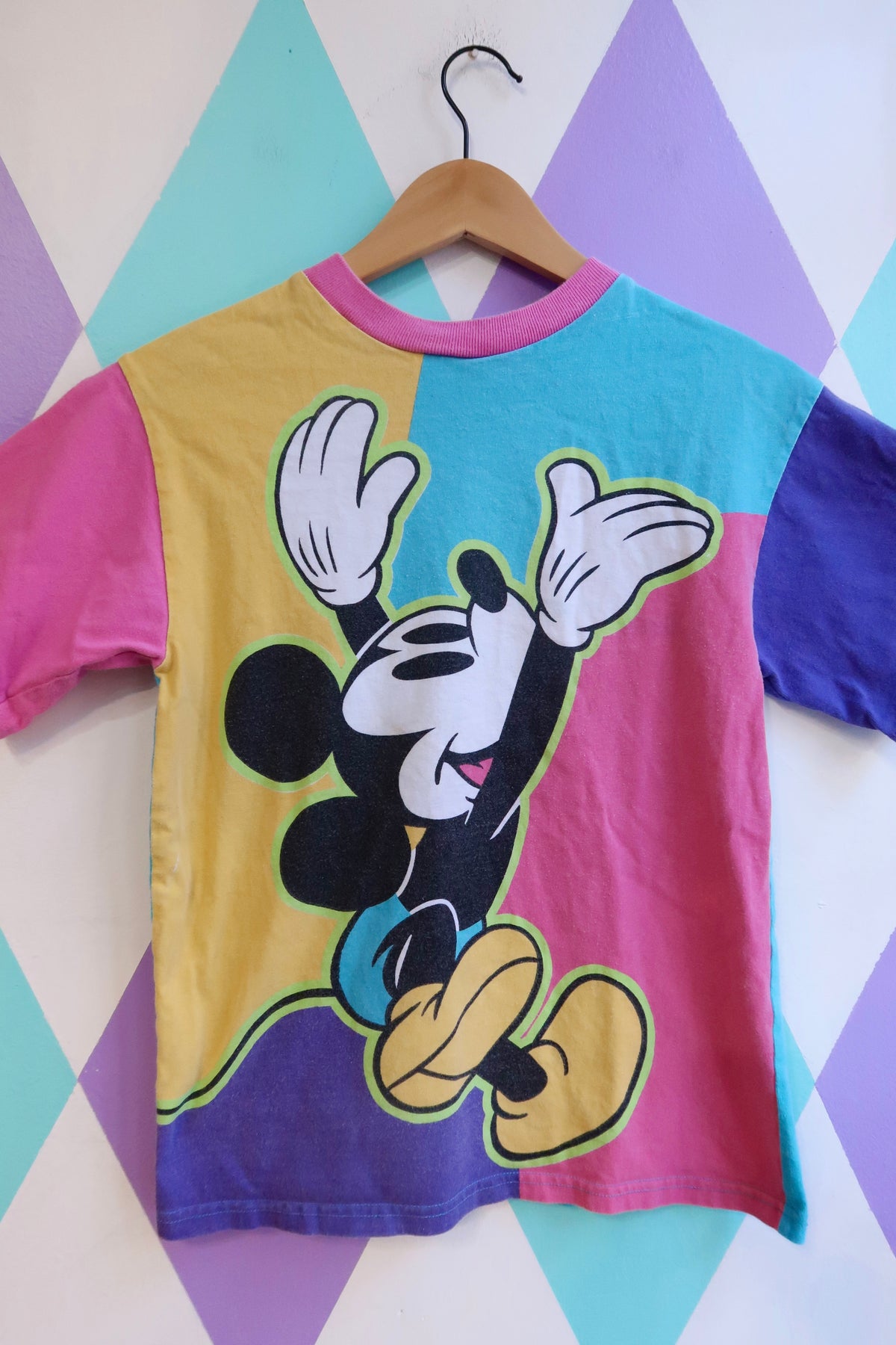 Women's vintage Mickey Mouse colorblock graphic tee by Elektra Vintage featuring Disney all-over print on a casual top.