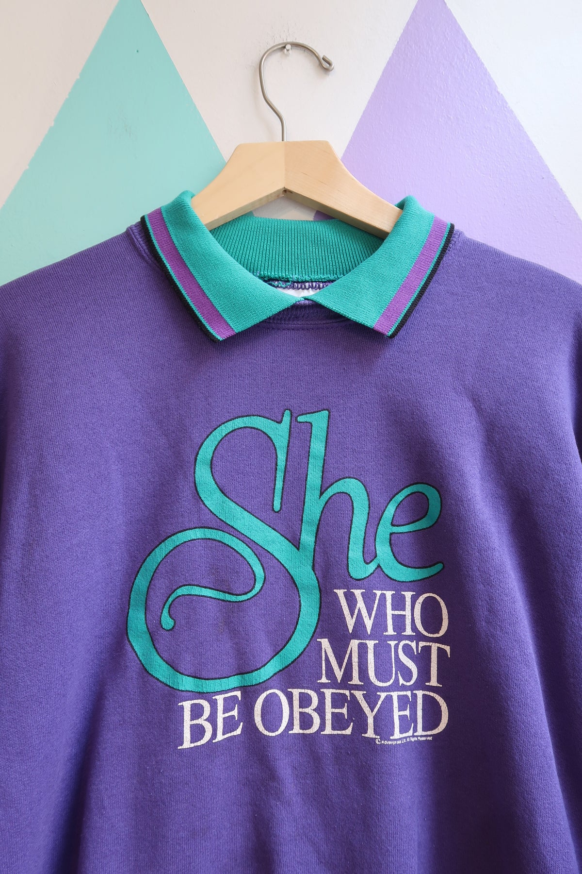 Vintage “She Who Must Be Obeyed” Graphic Sweatshirt – Purple with Teal Collar
