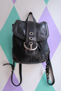Vintage Coach Soho black leather backpack by Elektra Vintage, Y2K drawstring mini bag with compact design and adjustable straps.
