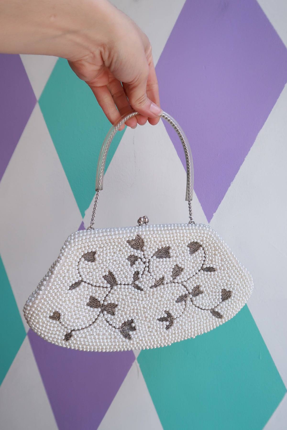 Elektra Vintage silver beaded pearl handbag with floral embellishments and top handle for bridal or evening occasions.
