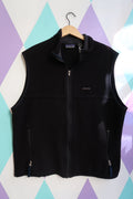 Men's vintage black fleece vest by Elektra Vintage, classic Patagonia-style men's top with cozy fleece fabric.