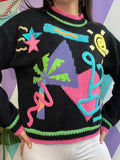 Vintage 80s Vapor Wave knit sweater by Elektra Vintage, featuring colorful retro patterns and cozy knit fabric.