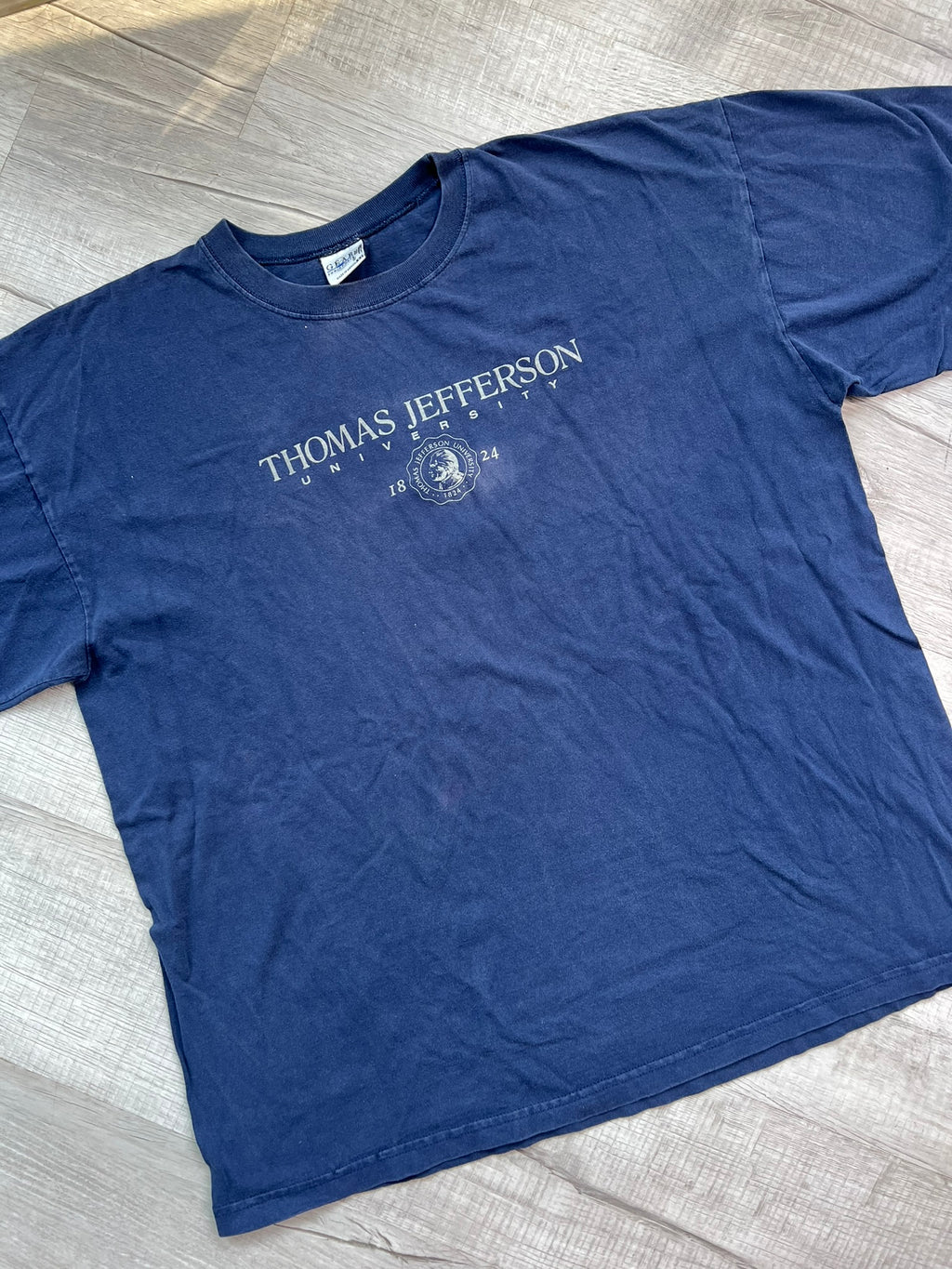 Vintage Thomas Jefferson University graphic tee by Elektra Vintage, featuring a classic university logo on soft fabric.