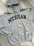 Elektra Vintage 2000s University of Michigan hoodie in navy with university logo and lettering, casual and comfortable sweatshirt.