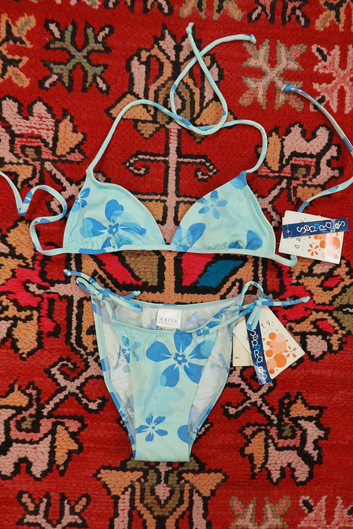 Vintage 2000s Elektra Vintage blue floral triangle bikini set with adjustable straps and matching bottoms.